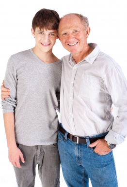 Happy teenage boy and grandfather